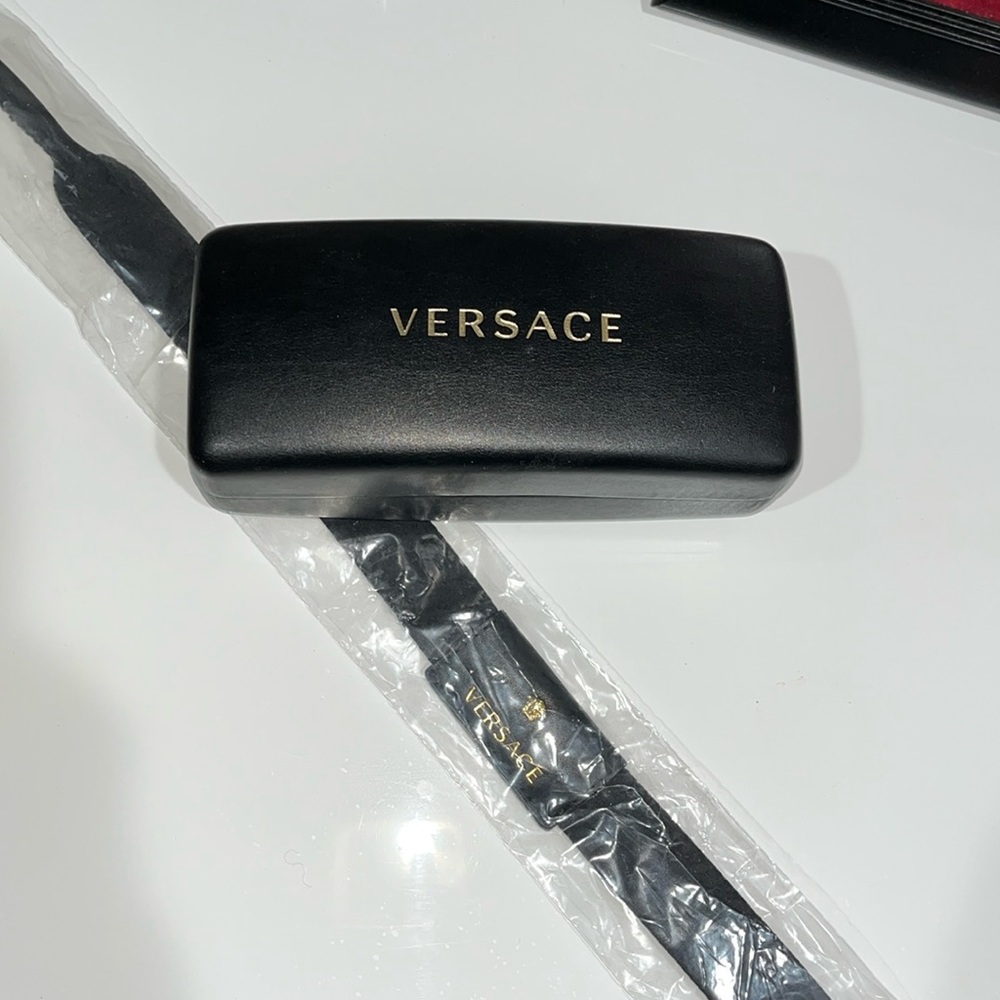Versace 🕶️ and strap.
